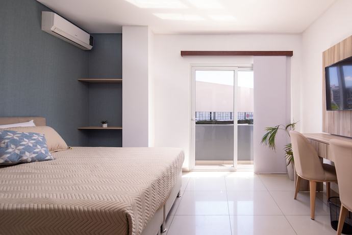 Imagen de la habitación del Hotel Equipetrol Suites Apart. Foto 18