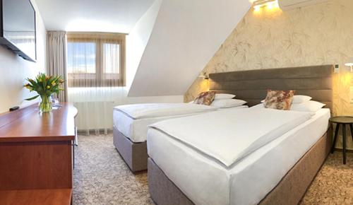 Imagen de la habitación del Hotel Equitana Resort. Foto 8