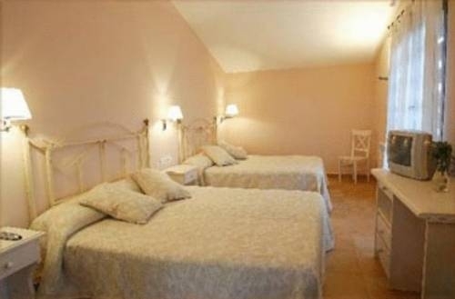 Imagen de la habitación del Hotel Era Conte. Foto 6