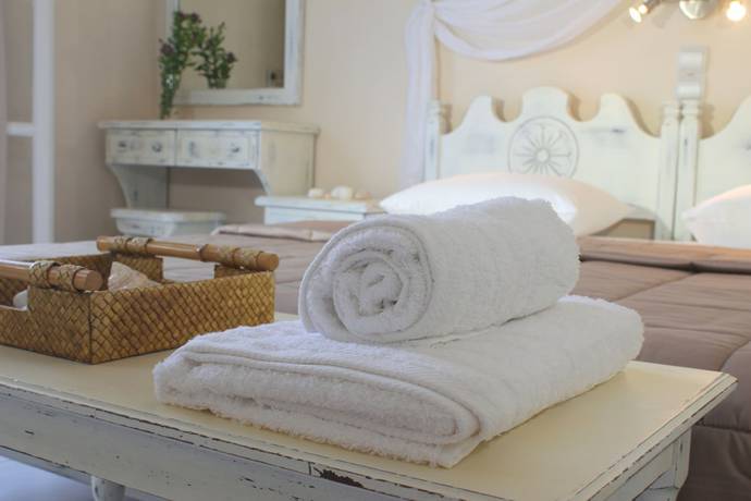 Imagen de la habitación del Hotel Erato Mykonos. Foto 11