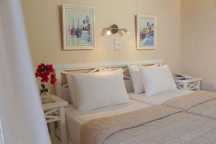 Imagen de la habitación del Hotel Erato Mykonos. Foto 14