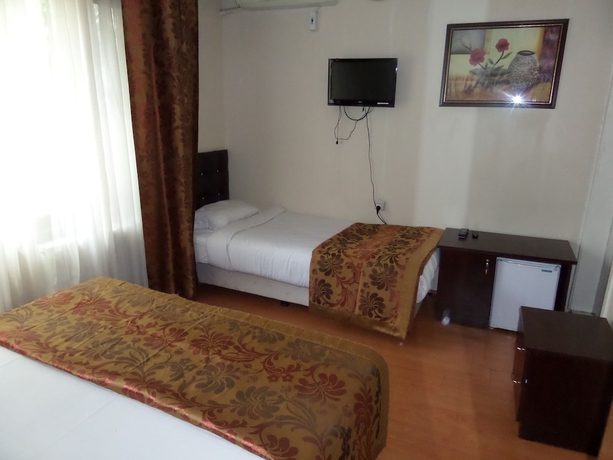 Imagen de la habitación del Hotel Ercan Inn. Foto 13