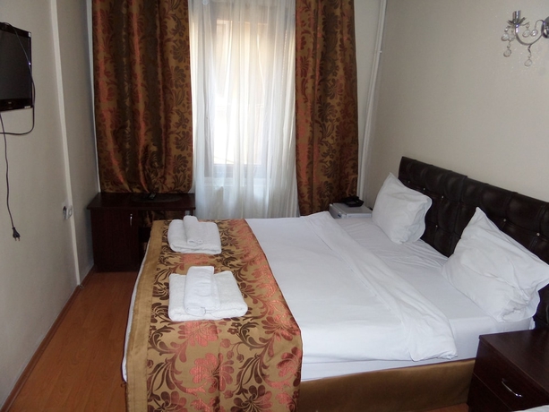 Imagen de la habitación del Hotel Ercan Inn. Foto 17