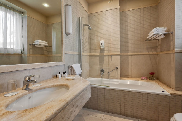 Imagen de la habitación del Hotel Ercolini E Savi. Foto 15