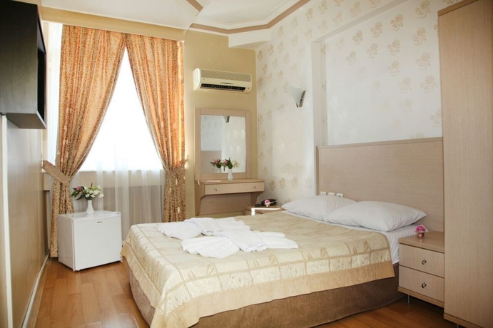 Imagen de la habitación del Hotel Erdem. Foto 12