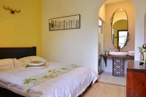 Imagen de la habitación del Hotel Erhai Gate No.1. Foto 10