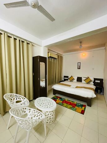 Imagen de la habitación del Hotel Erica Residency. Foto 11