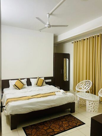 Imagen de la habitación del Hotel Erica Residency. Foto 12