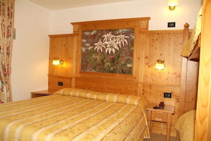Imagen de la habitación del Hotel Erika, Madonna di Campiglio. Foto 3