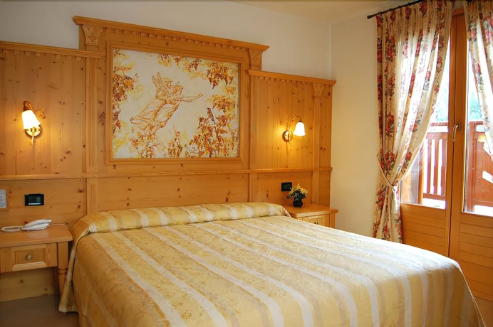 Imagen de la habitación del Hotel Erika, Madonna di Campiglio. Foto 4