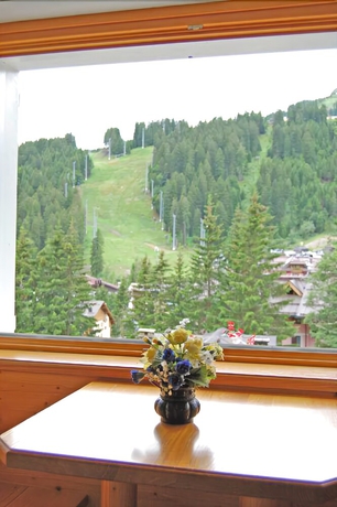 Imagen de la habitación del Hotel Erika, Madonna di Campiglio. Foto 13