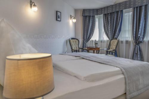 Imagen de la habitación del Hotel Erla Villa Boutique. Foto 7