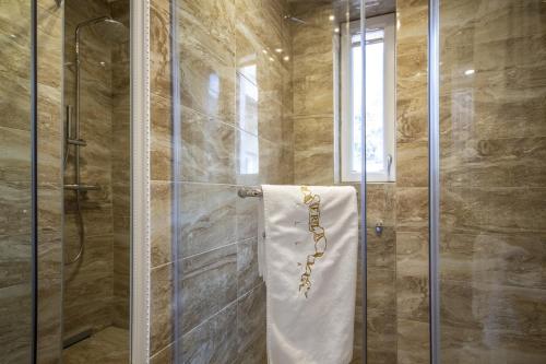 Imagen de la habitación del Hotel Erla Villa Boutique. Foto 10