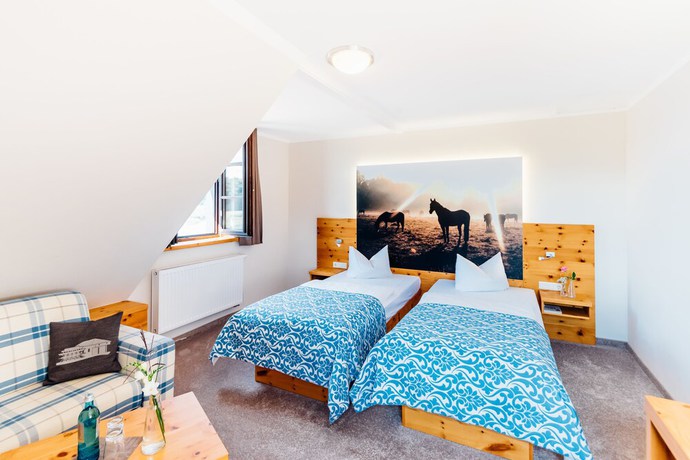 Imagen de la habitación del Hotel Erlebnishotel Zur Schiffsm&uuml;hle. Foto 12