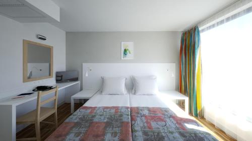 Imagen de la habitación del Hotel Erma. Foto 18