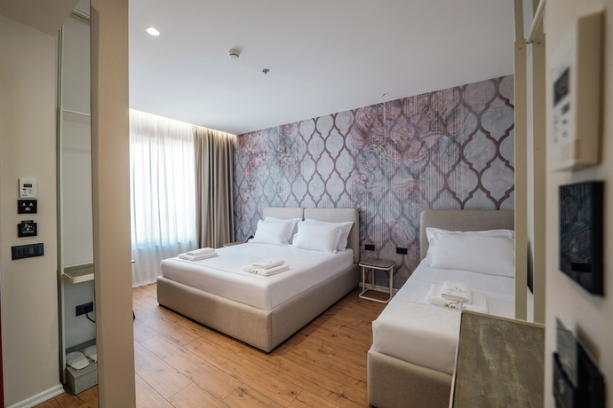 Imagen de la habitación del Hotel Ermes. Foto 9