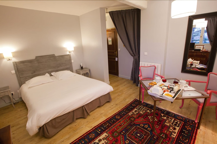 Imagen de la habitación del Hotel Ermitage De Corton. Foto 10