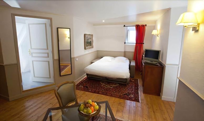 Imagen de la habitación del Hotel Ermitage De Corton. Foto 13