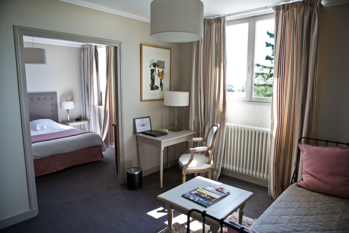 Imagen de la habitación del Hotel Ermitage De Corton. Foto 18