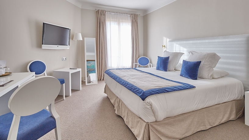 Imagen de la habitación del Hotel Ermitage De L'oasis and Spa - Cannes Mandelieu. Foto 8