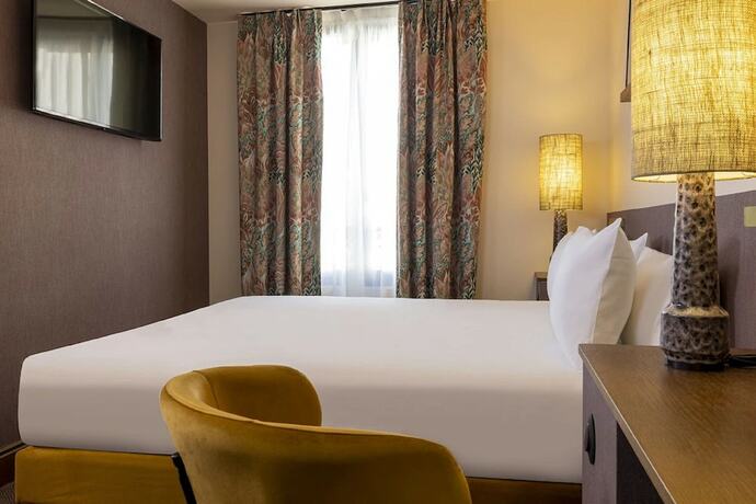 Imagen de la habitación del Hotel Ernest. Foto 17