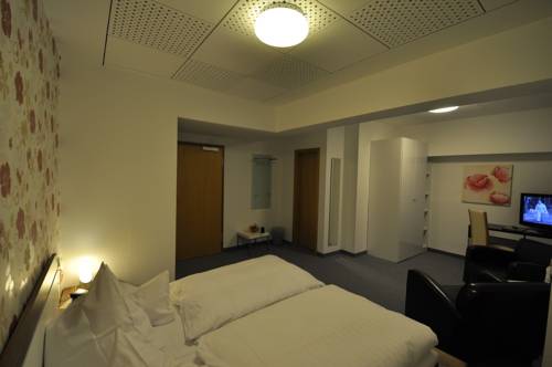 Imagen de la habitación del Hotel Ernsing's Garni. Foto 15