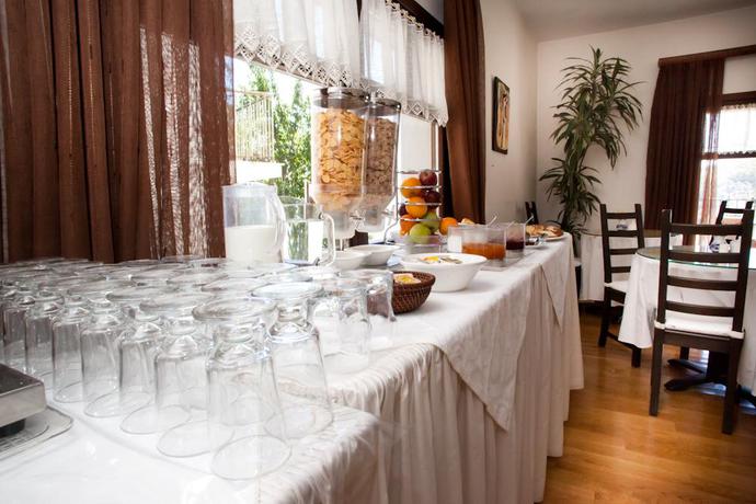 Imagen del bar/restaurante del Hotel Erofili Four Seasons. Foto 3