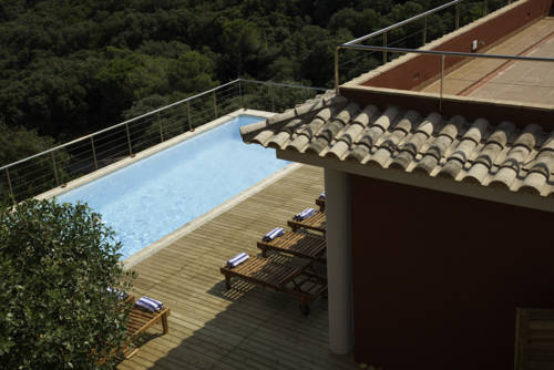 Imagen de la habitación del Hotel Es Cel De Begur. Foto 4