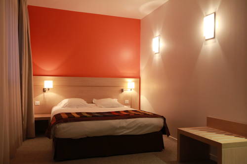 Imagen de la habitación del Hotel Esatitude. Foto 7