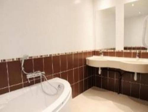 Imagen de la habitación del Hotel Esatitude. Foto 9