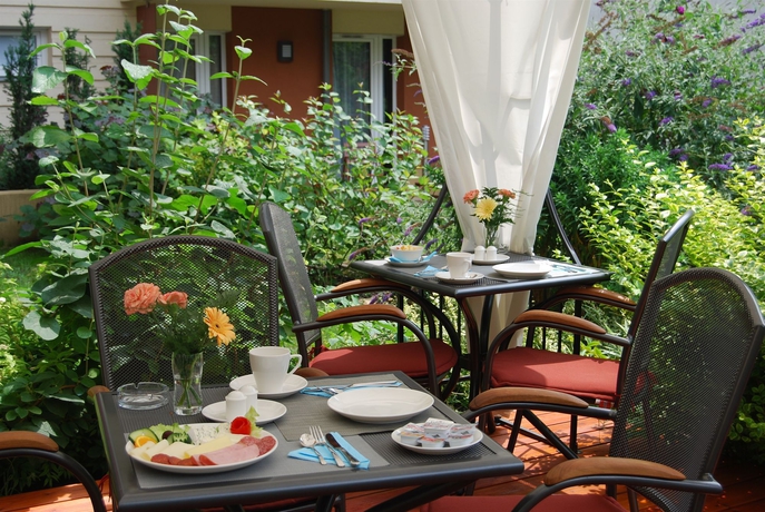 Imagen del bar/restaurante del Hotel Escala Hotel and Suites. Foto 3