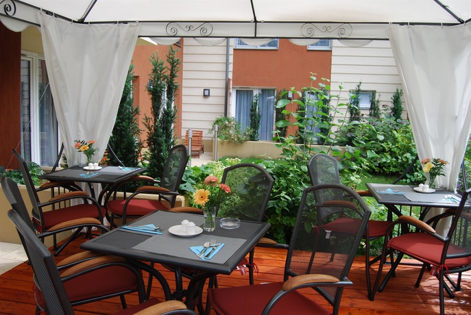 Imagen del bar/restaurante del Hotel Escala Hotel and Suites. Foto 4