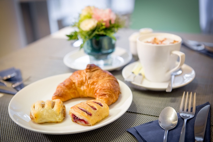 Imagen del bar/restaurante del Hotel Escala Hotel and Suites. Foto 6