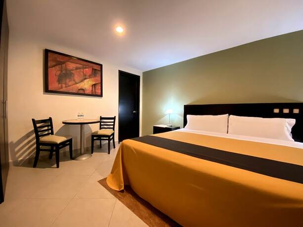 Imagen de la habitación del Hotel Escala Puebla Centro. Foto 15