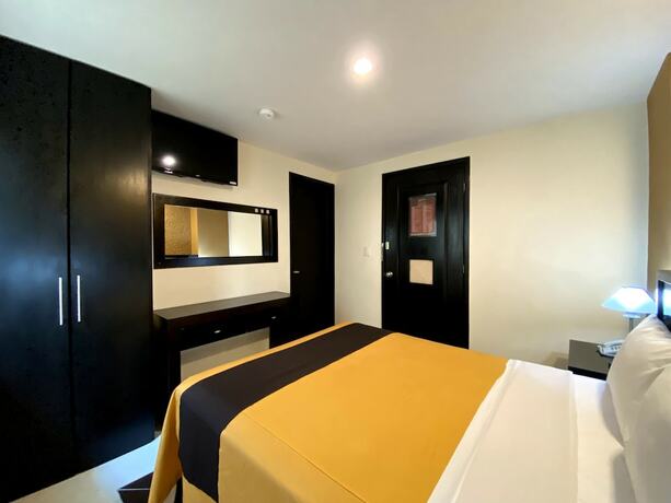 Imagen de la habitación del Hotel Escala Puebla Centro. Foto 17