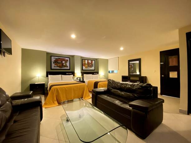 Imagen de la habitación del Hotel Escala Puebla Centro. Foto 19