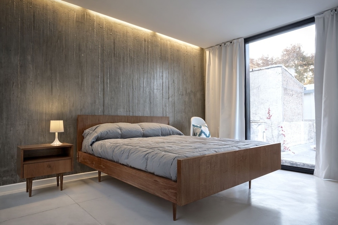 Imagen de la habitación del Hotel Escala83 Apartamentos. Foto 4