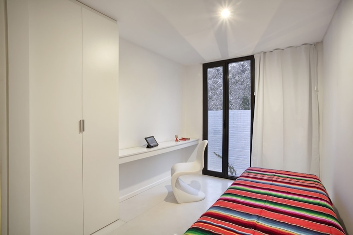 Imagen de la habitación del Hotel Escala83 Apartamentos. Foto 6