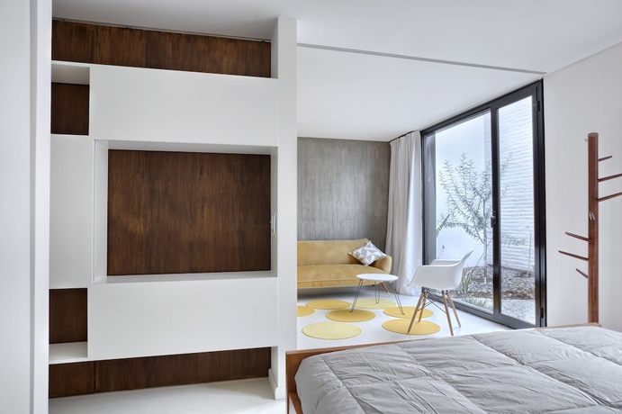 Imagen de la habitación del Hotel Escala83 Apartamentos. Foto 9