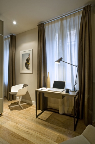 Imagen de la habitación del Hotel Escalus Luxury Suites Verona. Foto 3