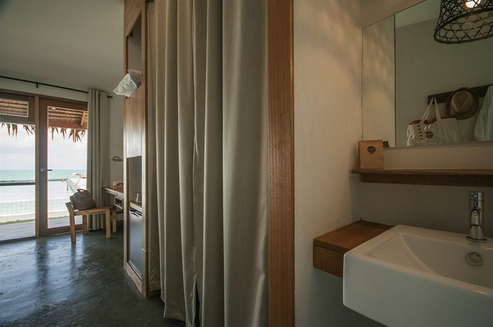 Imagen de la habitación del Hotel Escape Beach Resort. Foto 7