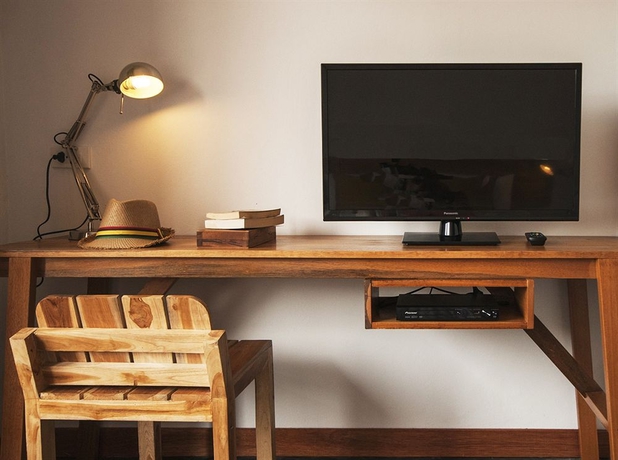 Imagen de la habitación del Hotel Escape Beach Resort. Foto 10