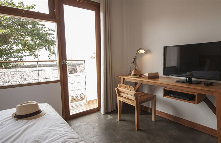 Imagen de la habitación del Hotel Escape Beach Resort. Foto 11