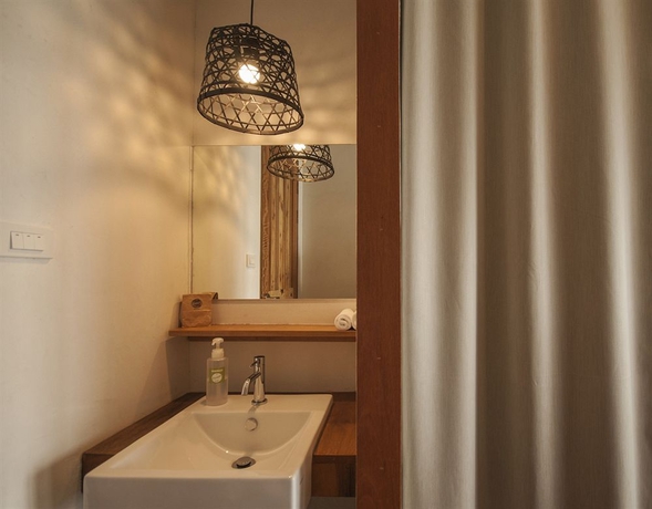 Imagen de la habitación del Hotel Escape Beach Resort. Foto 12