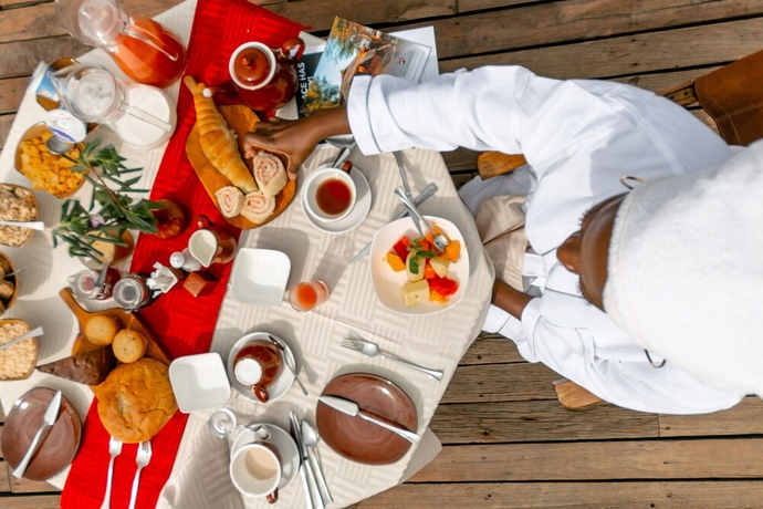 Imagen del bar/restaurante del Hotel Escarpment Luxury Lodge. Foto 4