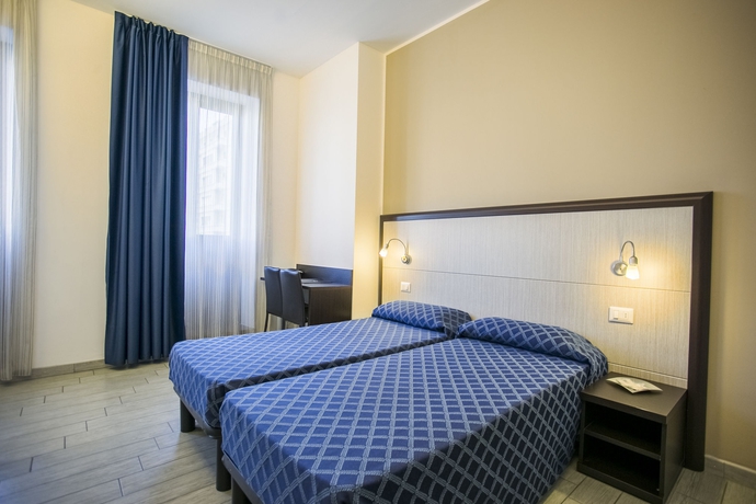 Imagen de la habitación del Hotel Esco. Foto 14