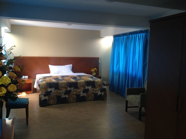 Imagen de la habitación del Hotel Esencia Suites. Foto 5