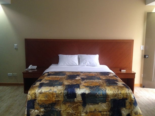 Imagen de la habitación del Hotel Esencia Suites. Foto 6