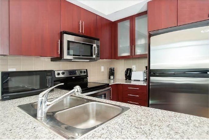 Imagen de la habitación del Hotel E.s.i Furnished Suites At The Acc. Foto 7