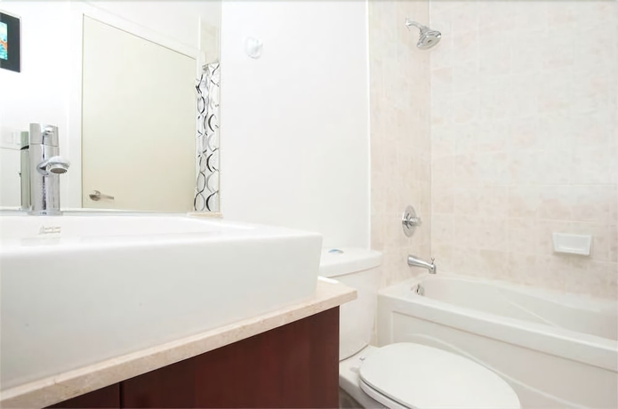 Imagen de la habitación del Hotel E.s.i Furnished Suites At The Acc. Foto 13